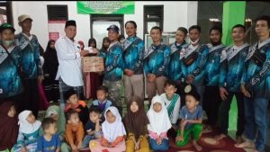 Komunitas Mancing Asix Fishing Club Santuni Yatim Piatu